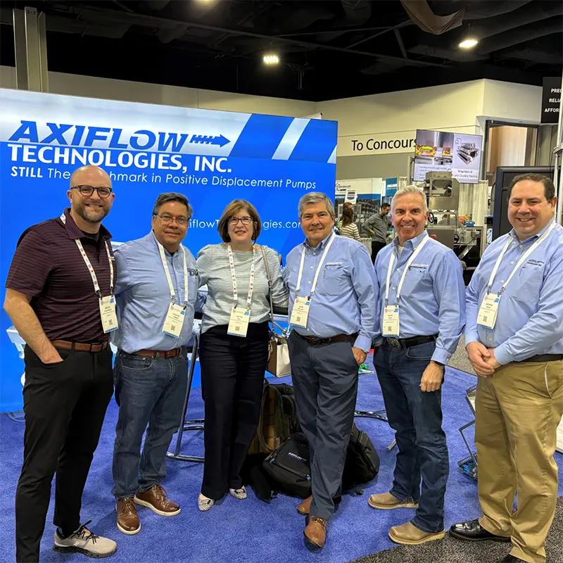 Axiflow team members at a trade show